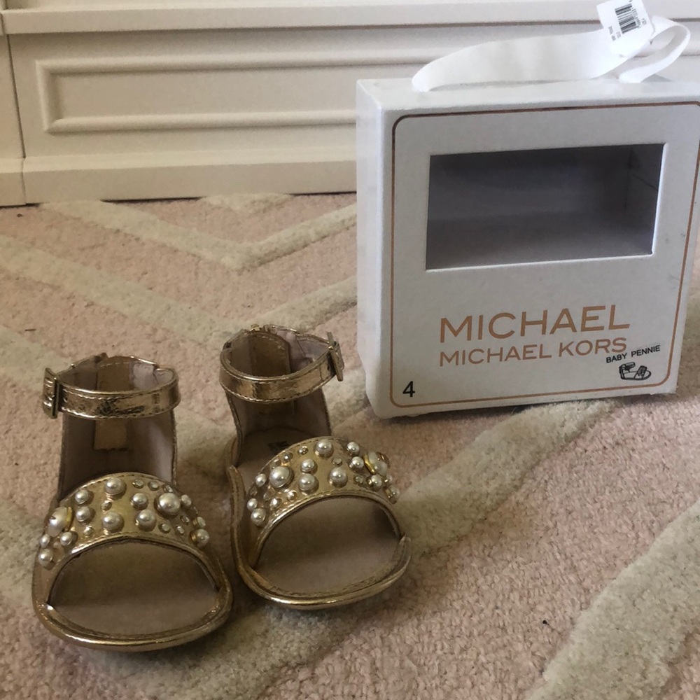 Gorgeous gold Michael Kors Sandals for a little girl